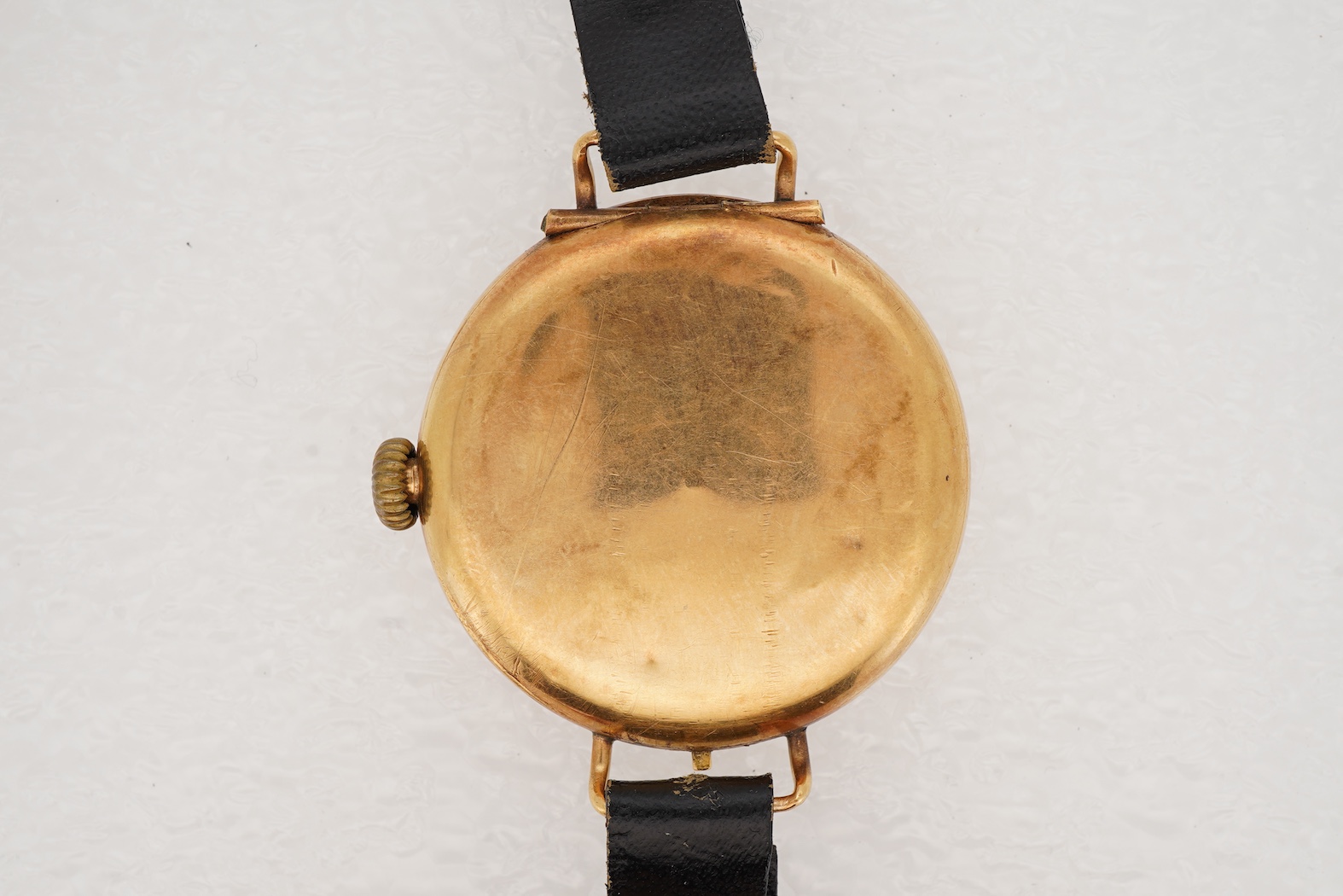 A gentleman's early to mid 20th century 18ct gold half hunter Coventry lever manual wind wrist watch